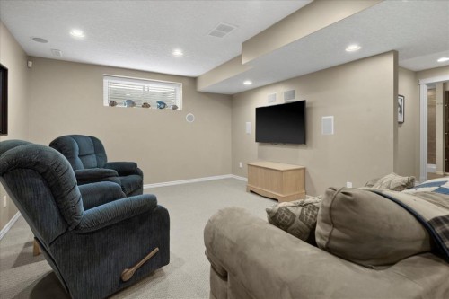 66 Tuscany Reserve Gate Nw, Calgary, AB - Indoor Photo Showing Basement