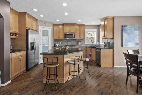 66 Tuscany Reserve Gate Nw, Calgary, AB - Indoor Photo Showing Kitchen