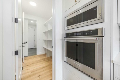 495 Rivercrest View, Cochrane, AB - Indoor Photo Showing Kitchen