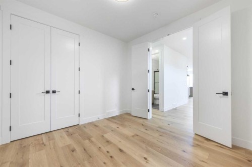 495 Rivercrest View, Cochrane, AB - Indoor Photo Showing Other Room