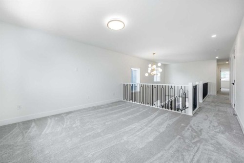 495 Rivercrest View, Cochrane, AB - Indoor Photo Showing Other Room