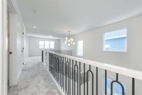 495 Rivercrest View, Cochrane, AB - Indoor Photo Showing Other Room