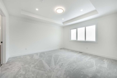 495 Rivercrest View, Cochrane, AB - Indoor Photo Showing Other Room