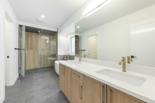 495 Rivercrest View, Cochrane, AB - Indoor Photo Showing Bathroom