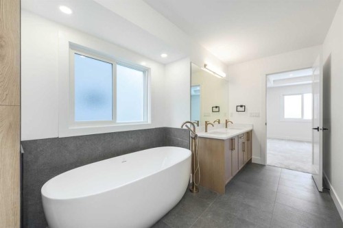 495 Rivercrest View, Cochrane, AB - Indoor Photo Showing Bathroom
