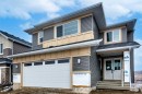 495 Rivercrest View, Cochrane, AB  - Outdoor With Facade 