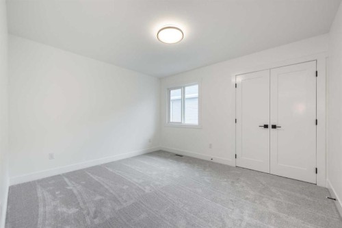 495 Rivercrest View, Cochrane, AB - Indoor Photo Showing Other Room