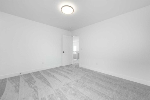 495 Rivercrest View, Cochrane, AB - Indoor Photo Showing Other Room