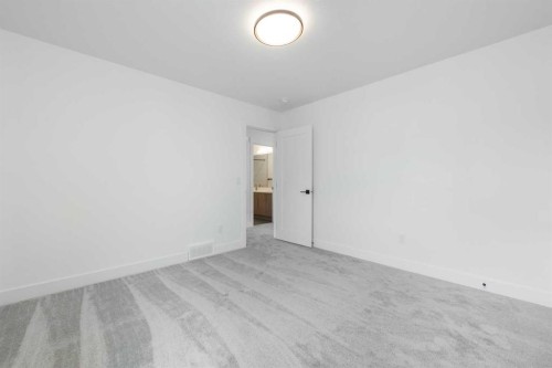 495 Rivercrest View, Cochrane, AB - Indoor Photo Showing Other Room