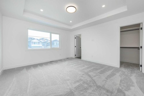 495 Rivercrest View, Cochrane, AB - Indoor Photo Showing Other Room