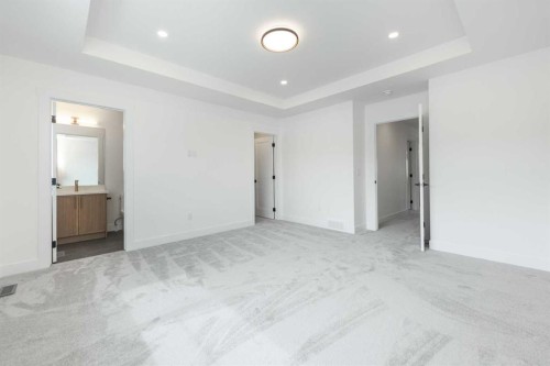 495 Rivercrest View, Cochrane, AB - Indoor Photo Showing Other Room