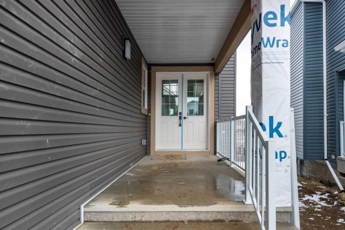 495 Rivercrest View, Cochrane, AB - Outdoor With Exterior