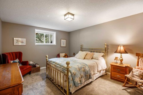 94 Sunset Way, Priddis Greens, AB - Indoor Photo Showing Bedroom