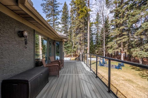 94 Sunset Way, Priddis Greens, AB - Outdoor With Deck Patio Veranda With Exterior