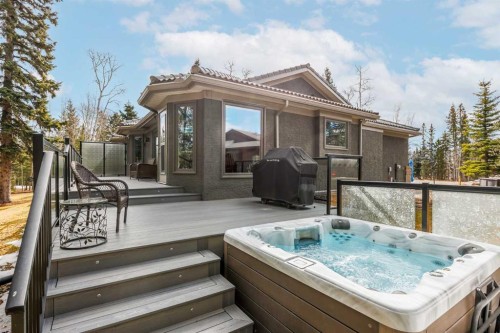 94 Sunset Way, Priddis Greens, AB - Outdoor With Deck Patio Veranda