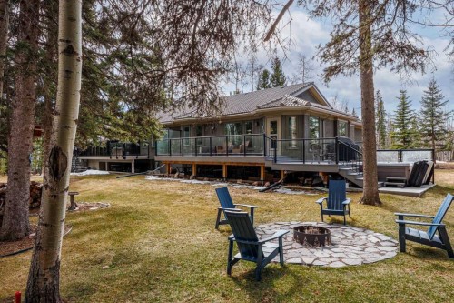 94 Sunset Way, Priddis Greens, AB - Outdoor With Deck Patio Veranda