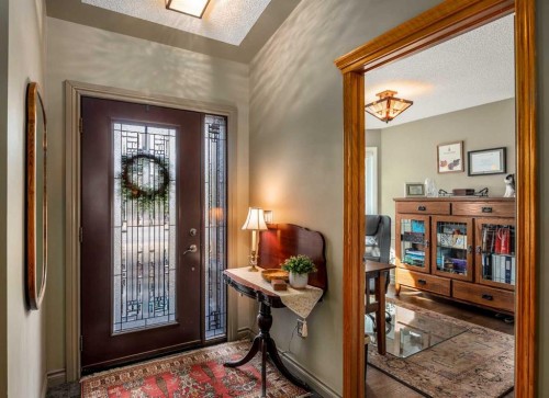 94 Sunset Way, Priddis Greens, AB - Indoor Photo Showing Other Room