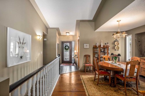 94 Sunset Way, Priddis Greens, AB - Indoor Photo Showing Dining Room