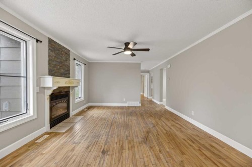 30338 Range Road 282, Rural Mountain View County, AB - Indoor With Fireplace