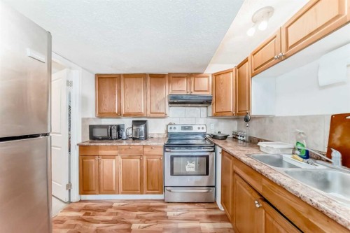 36 Saddleland Court Ne, Calgary, AB - Indoor Photo Showing Kitchen