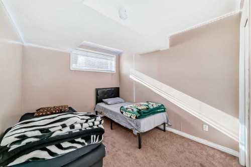 36 Saddleland Court Ne, Calgary, AB - Indoor Photo Showing Bedroom
