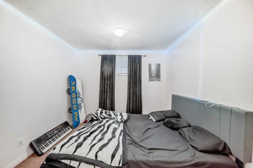 36 Saddleland Court Ne, Calgary, AB - Indoor Photo Showing Bedroom