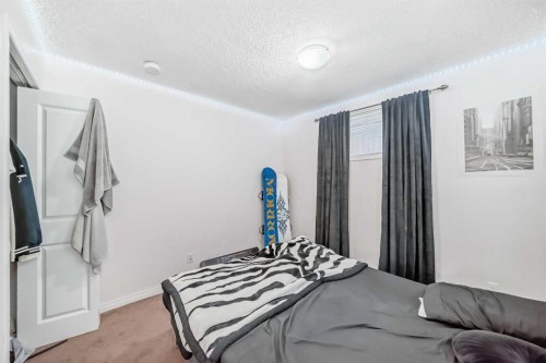 36 Saddleland Court Ne, Calgary, AB - Indoor Photo Showing Bedroom