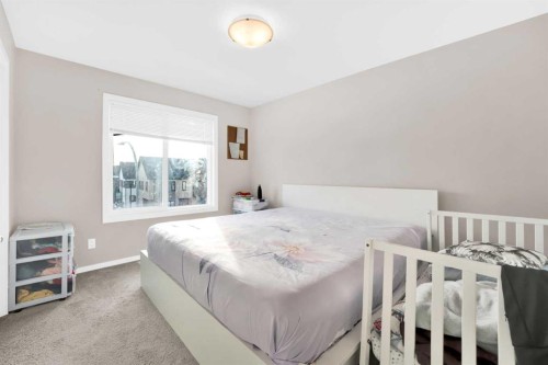 202-135 Redstone Walk Ne, Calgary, AB - Indoor Photo Showing Bedroom