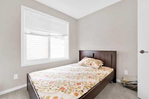 202-135 Redstone Walk Ne, Calgary, AB - Indoor Photo Showing Bedroom