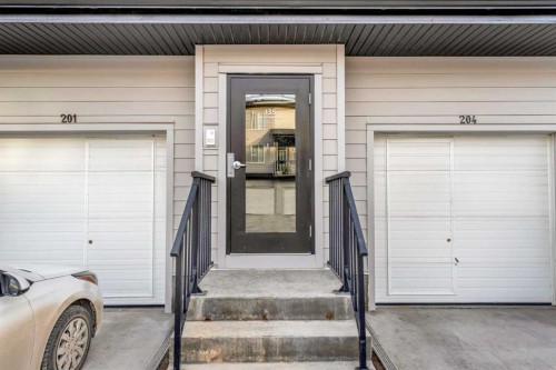 202-135 Redstone Walk Ne, Calgary, AB - Indoor Photo Showing Garage