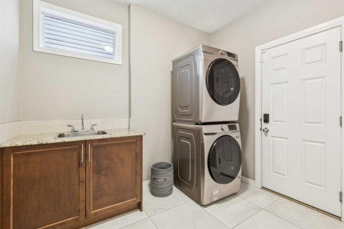 71 Walden Manor Se, Calgary, AB - Indoor Photo Showing Laundry Room