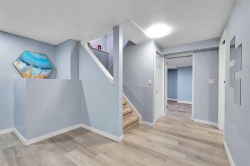 44 Strathclair Rise Sw, Calgary, AB - Indoor Photo Showing Other Room