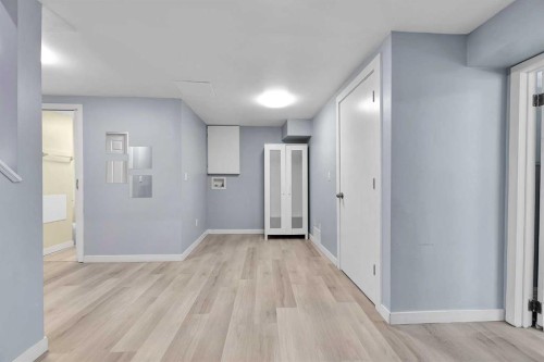 44 Strathclair Rise Sw, Calgary, AB - Indoor Photo Showing Other Room