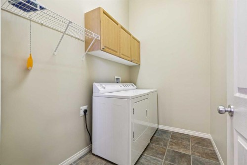 19 Wentworth Gardens Sw, Calgary, AB - Indoor Photo Showing Laundry Room