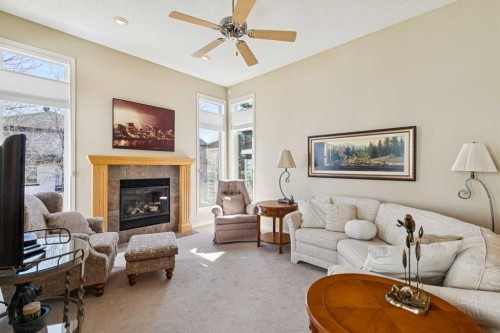 19 Wentworth Gardens Sw, Calgary, AB - Indoor Photo Showing Living Room With Fireplace