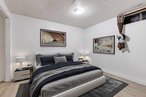 41 Alpine Crescent Se, Airdrie, AB - Indoor Photo Showing Bedroom