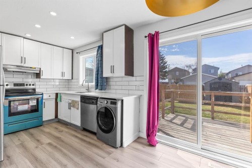 13 Martindale Boulevard Ne, Calgary, AB - Indoor Photo Showing Laundry Room