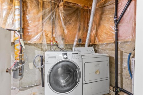 13 Martindale Boulevard Ne, Calgary, AB - Indoor Photo Showing Laundry Room