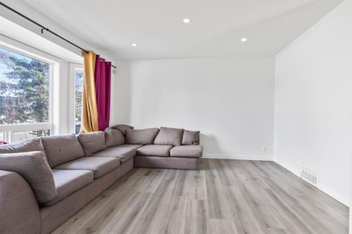 13 Martindale Boulevard Ne, Calgary, AB - Indoor Photo Showing Living Room
