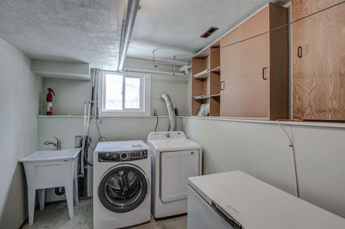 8408 Berkley Road Nw, Calgary, AB - Indoor Photo Showing Laundry Room
