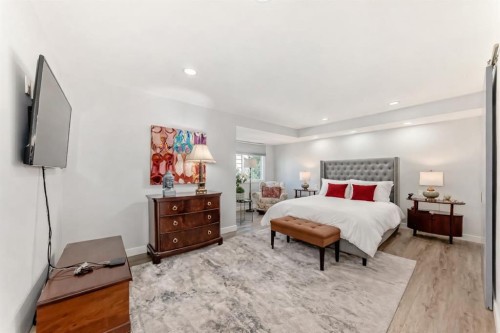22 Coach Manor Terrace Sw, Calgary, AB - Indoor Photo Showing Bedroom
