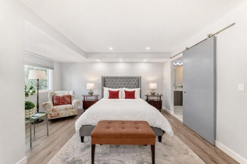 22 Coach Manor Terrace Sw, Calgary, AB - Indoor Photo Showing Bedroom