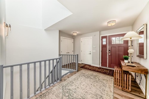22 Coach Manor Terrace Sw, Calgary, AB - Indoor Photo Showing Other Room