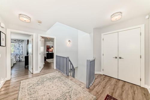 22 Coach Manor Terrace Sw, Calgary, AB - Indoor Photo Showing Other Room