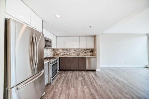 204-560 6 Avenue Se, Calgary, AB - Indoor Photo Showing Kitchen With Stainless Steel Kitchen With Double Sink With Upgraded Kitchen