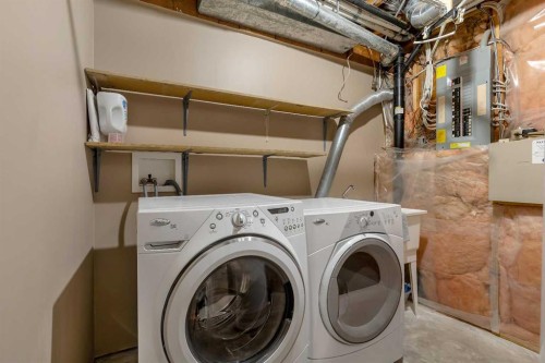 2856 Signal Hill Heights Sw, Calgary, AB - Indoor Photo Showing Laundry Room