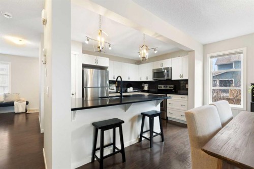 88 Copperpond Park Se, Calgary, AB - Indoor Photo Showing Kitchen With Upgraded Kitchen