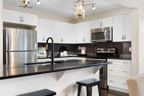 88 Copperpond Park Se, Calgary, AB - Indoor Photo Showing Kitchen With Upgraded Kitchen