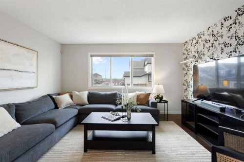 88 Copperpond Park Se, Calgary, AB - Indoor Photo Showing Living Room