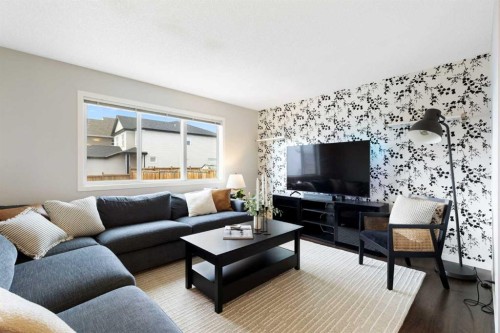 88 Copperpond Park Se, Calgary, AB - Indoor Photo Showing Living Room